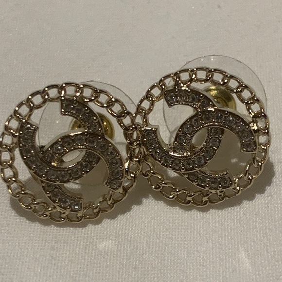 CHANEL authentic brand new Gold and Silver Logo Earrings with crystals , box